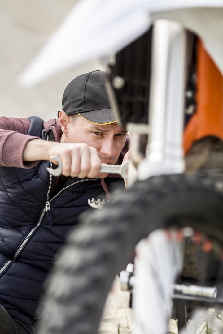 portrait-man-trying-fix-motorbike-1